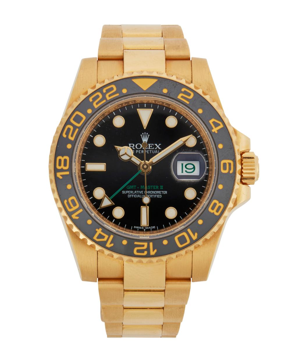 A ROLEX GMT MASTER II GOLD WRISTWATCHA 343520