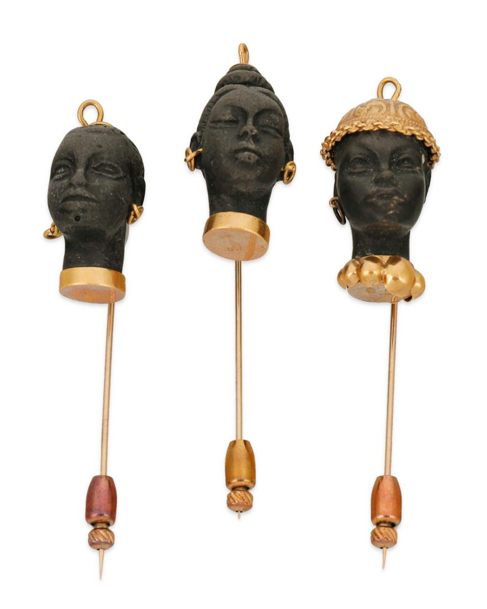 THREE BLACKAMOOR STICK PINSThree 343555