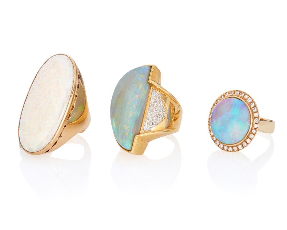 THREE OPAL RINGSThree opal rings  3435a3