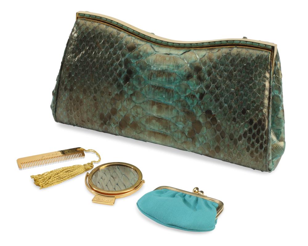 A JUDITH LEIBER GREEN LEATHER CLUTCH