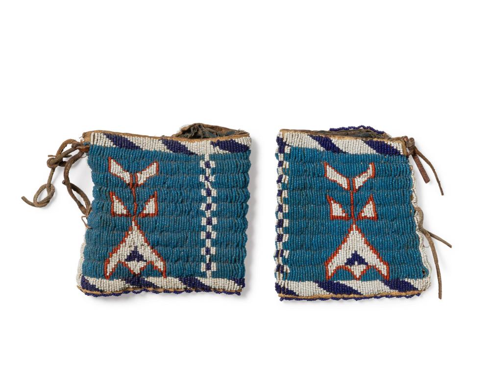 A PAIR OF SIOUX BEADED HIDE GAUNTLETSA 343d0d