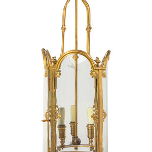 A Gothic Style Gilt Bronze Three-Light