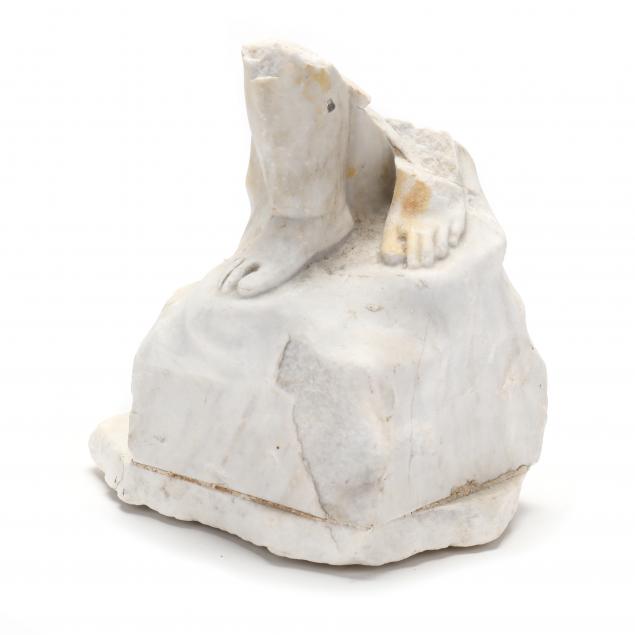 A CARVED MARBLE FIGURAL FRAGMENT 3467f1