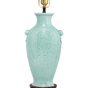 A Chinese Molded Celadon Ground