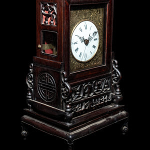 A Chinese Export Rosewood Clock of 346a13