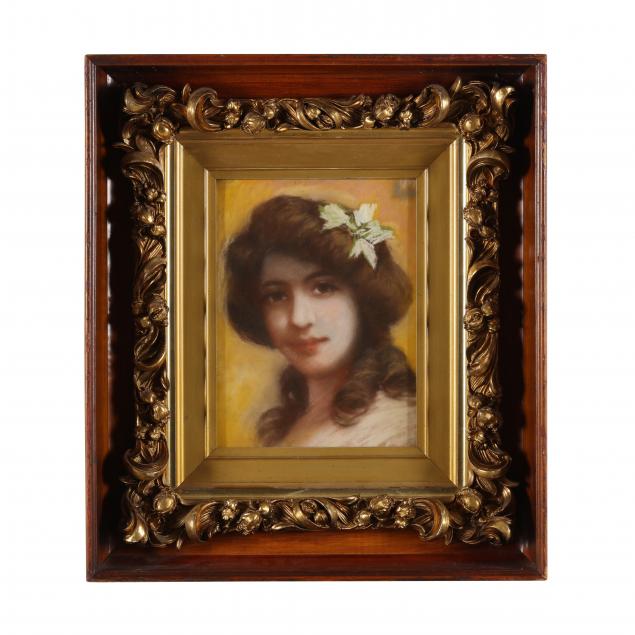 AN ANTIQUE PORTRAIT OF A YOUNG