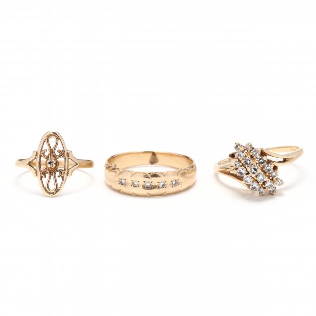 THREE GOLD AND DIAMOND RINGS To