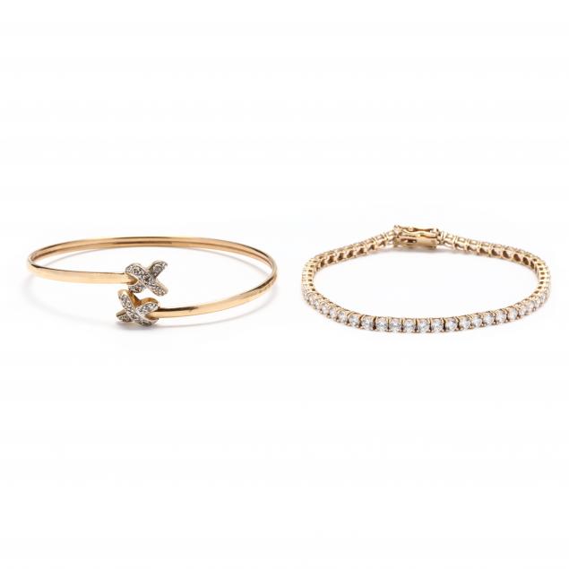 TWO GOLD AND GEM-SET BRACELETS To include: