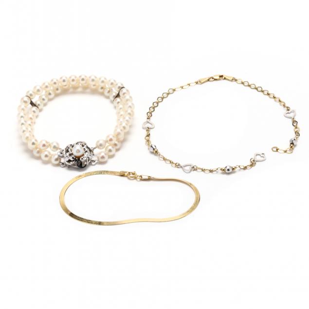 THREE JEWELRY ITEMS To include: