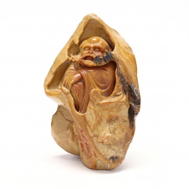 A SOAPSTONE CARVING OF BODHIDHARMA