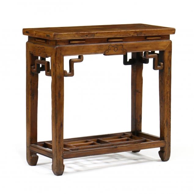 A CHINESE CARVED WOOD SIDE TABLE 346d00