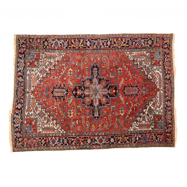 HERIZ RUG With navy blue medallion,