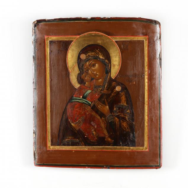 AN ANTIQUE ICON OF THE VIRGIN OF