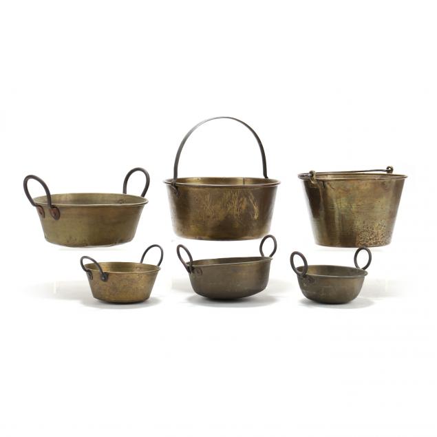 A SELECTION OF SIX BRASS KETTLES