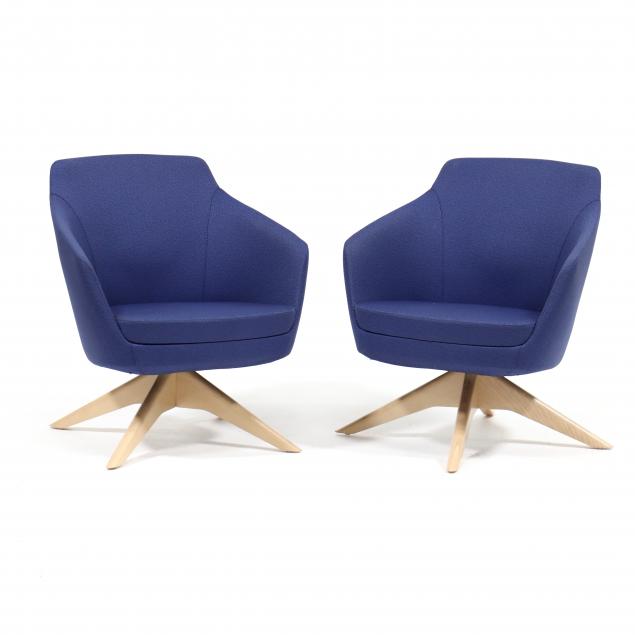 PAIR OF MODERNIST SWIVEL CLUB CHAIRS
