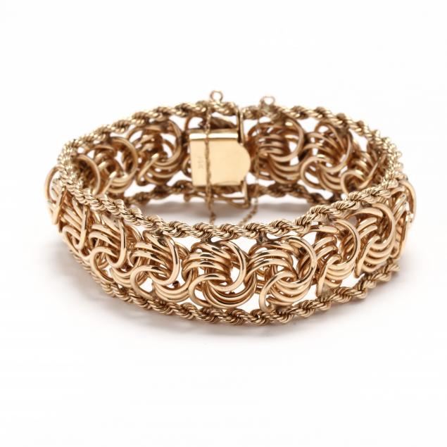 GOLD BRACELET In a mixed link design 347102