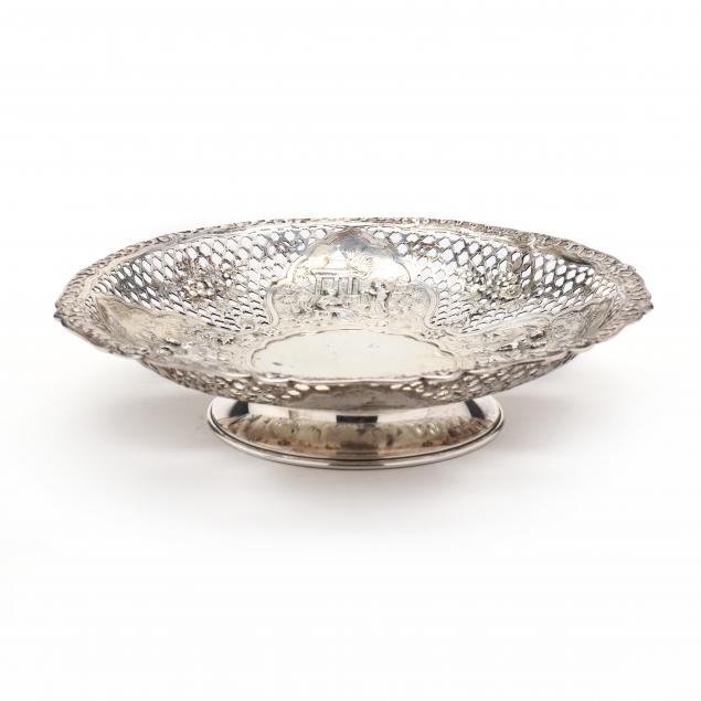 AN ANTIQUE .800 SILVER FOOTED DISH