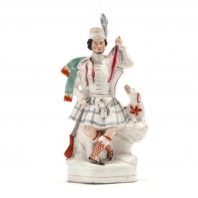 LARGE STAFFORDSHIRE FIGURINE OF A HUNTER