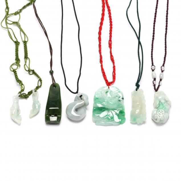 SEVEN JADE AND NEPHRITE PENDANTS