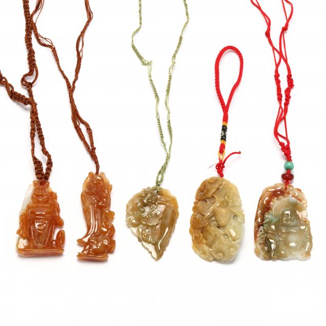 FIVE JADE PENDANTS To include: