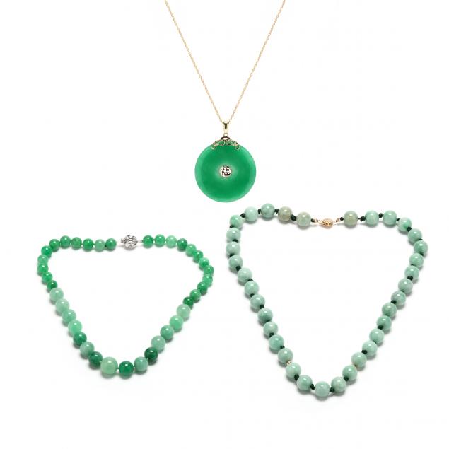 TWO JADE BEAD NECKLACES AND A JADE 34763e