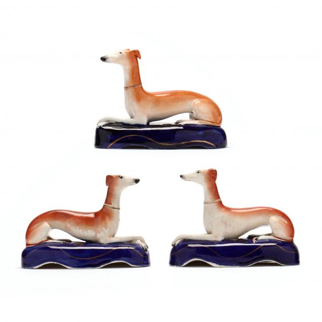 THREE ANTIQUE STAFFORDSHIRE WHIPPET
