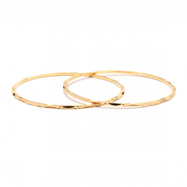 TWO GOLD BANGLES In high polish 347a33