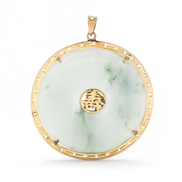 GOLD AND JADE BI DISC PENDANT The mottled