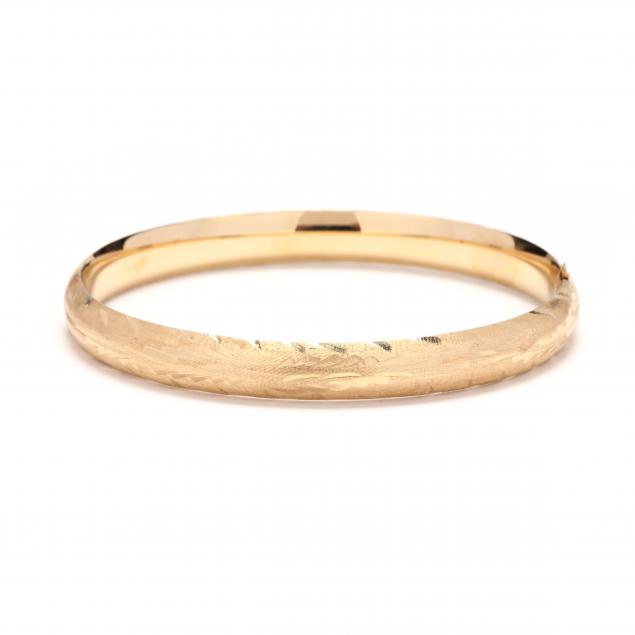 GOLD BANGLE BRACELET The hinged bangle