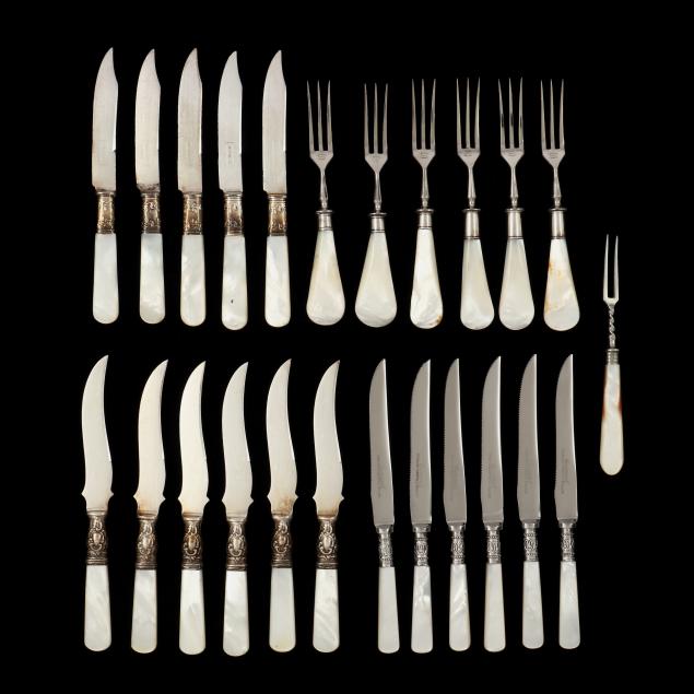 ASSEMBLED SET OF MOTHER OF PEARL HANDLED