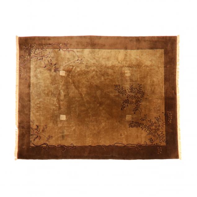 CHINESE RUG Light brown field with