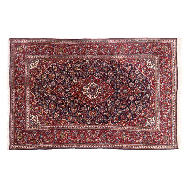 PERSIAN RUG Center red poled medallion