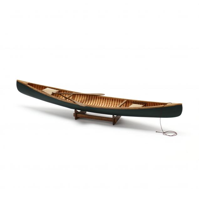 VINTAGE MODEL OF A CANOE 20th century,