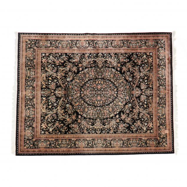 INDO-PERSIAN RUG Black field and