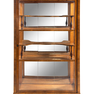 A Biedermeier Cherrywood Vitrine
Second