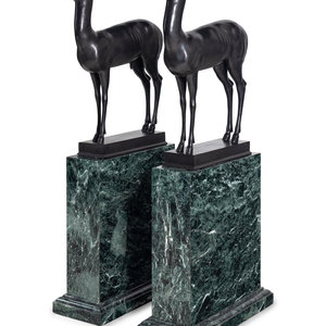 A Pair of Bronze Models of Pompeiian
