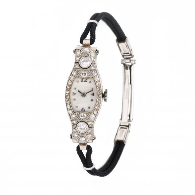 ART DECO WHITE GOLD AND DIAMOND WATCH,