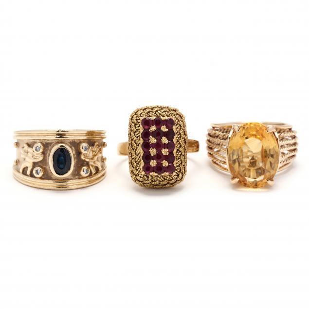 THREE GOLD AND GEM-SET RINGS To