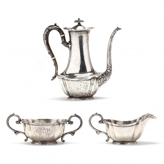 AN ANTIQUE STERLING SILVER DEMITASSE