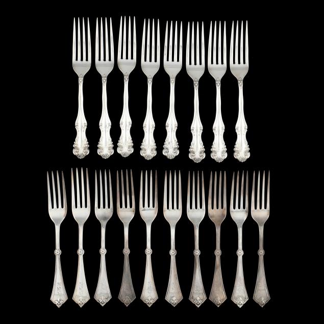 TWO SETS OF STERLING SILVER FORKS (18)