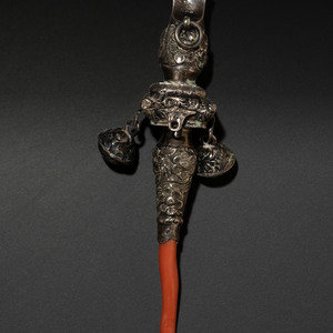 A Silver and Coral Mounted Child's