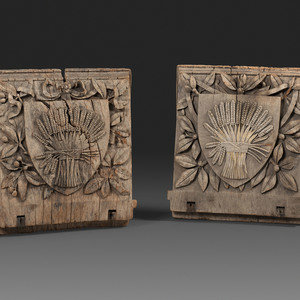 A Pair of English Carved Wood Baker's