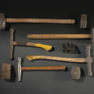 Nine Cast Iron Logging Stamps and Hammers
Late