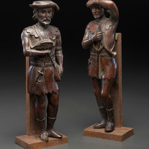 A Pair of Continental Carved Oak