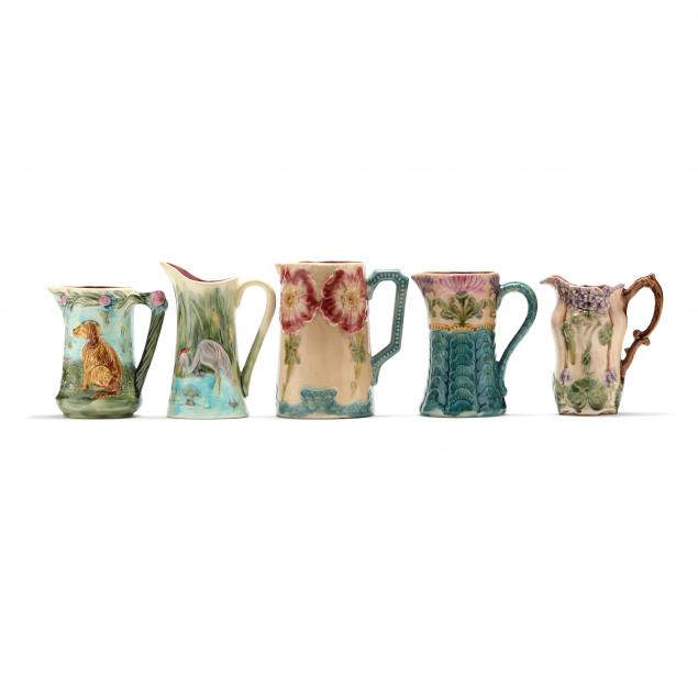 FIVE MAJOLICA PITCHERS Made in 345c5a