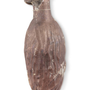 A Roman Amber Glass Date Flask
Circa
