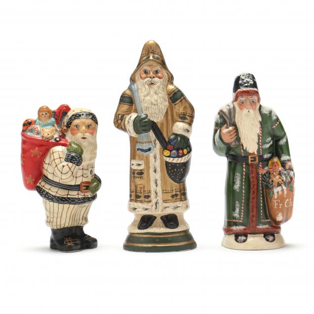 THREE VAILLANCOURT SANTAS CARRYING