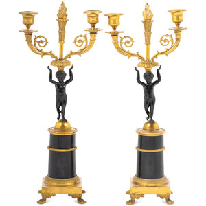 A Pair of Empire Style Parcel Gilt