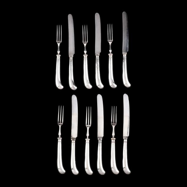 AN EDWARDIAN SILVER FRUIT FLATWARE 346560