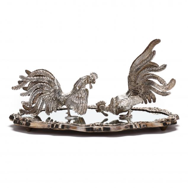 A PAIR OF STERLING SILVER FIGHTING